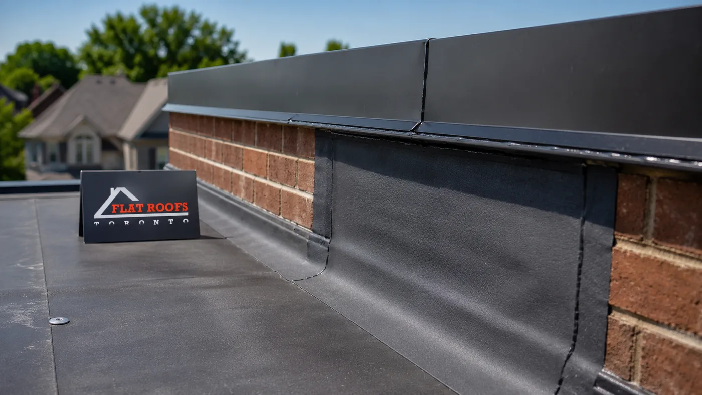 Close-up of repaired membrane seam and flashing detail following emergency roof repair on a Scarborough flat roof