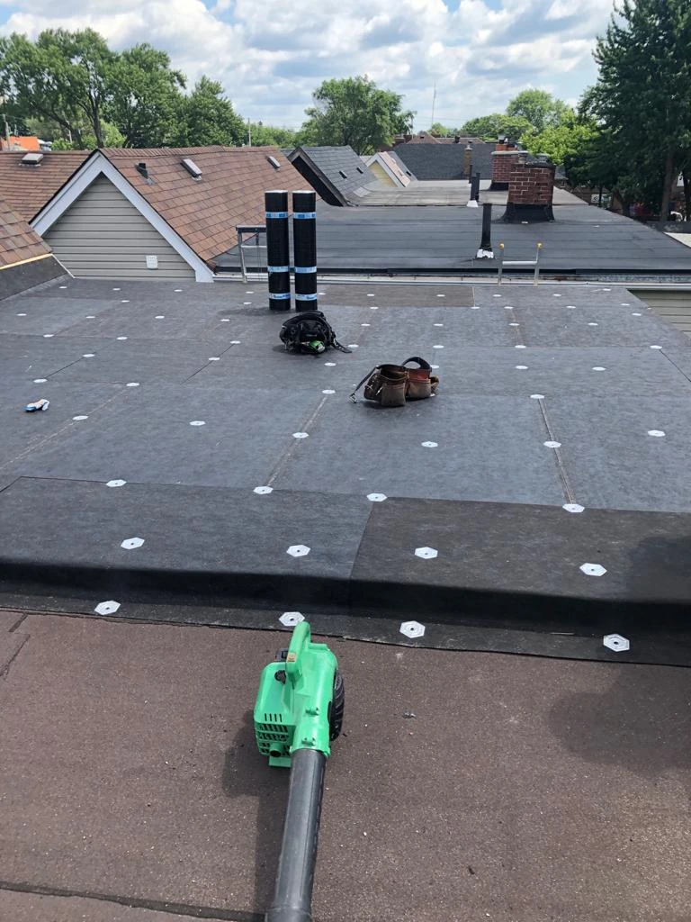 Two-ply modified bitumen torch-down membrane on a Toronto flat roof, view 14
