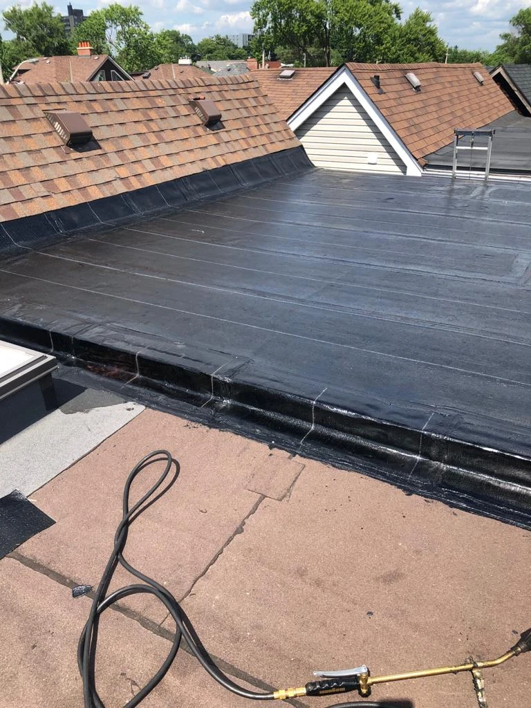 Two-ply modified bitumen torch-down membrane on a Toronto flat roof, view 20