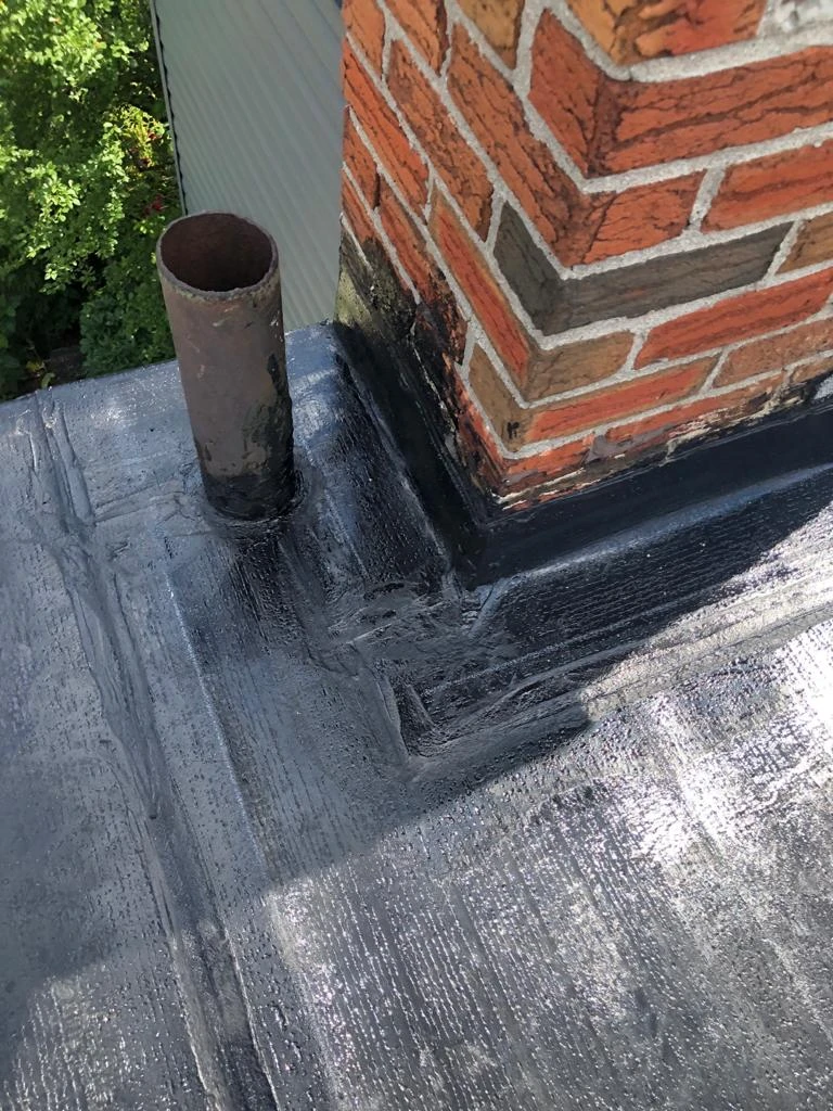 Two-ply modified bitumen torch-down membrane on a Toronto flat roof, view 22