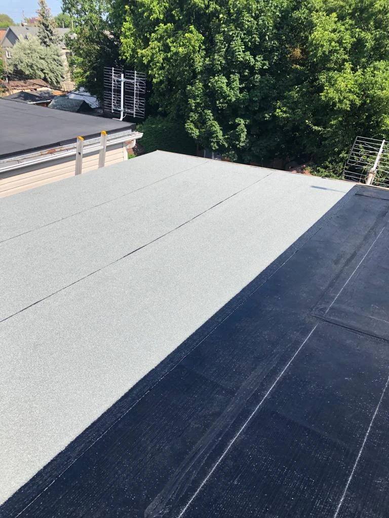 Two-ply modified bitumen torch-down membrane on a Toronto flat roof, view 28