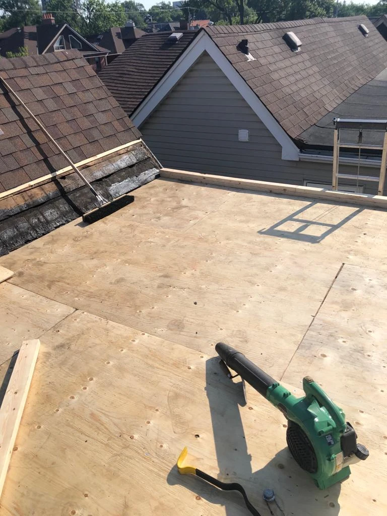 Two-ply modified bitumen torch-down membrane on a Toronto flat roof, view 29