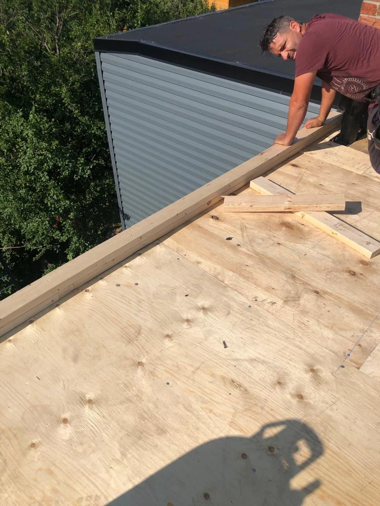 Two-ply modified bitumen torch-down membrane on a Toronto flat roof, view 3