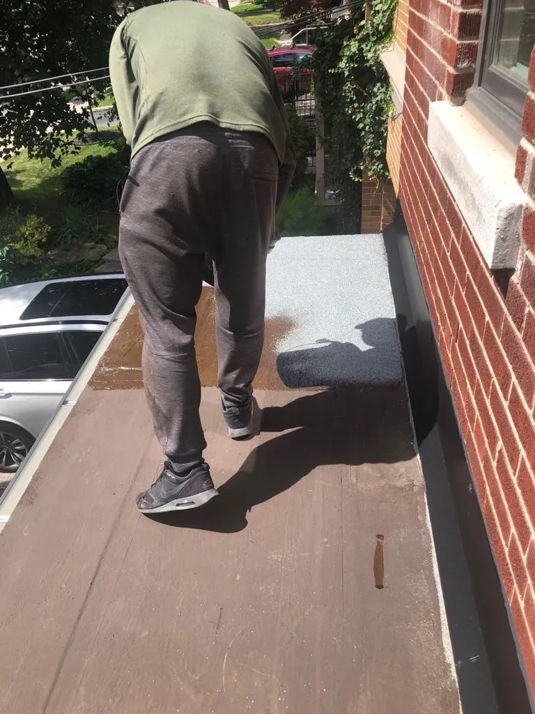 Cold-ply flat roof membrane with ceramic granule surfacing in Toronto, view 15