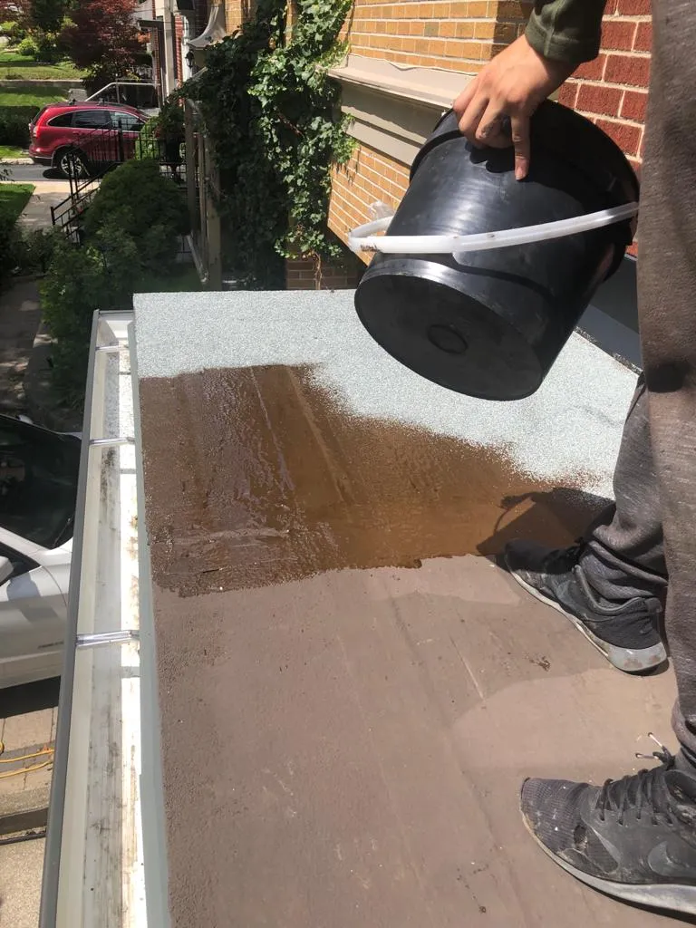 Cold-ply flat roof membrane with ceramic granule surfacing in Toronto, view 16