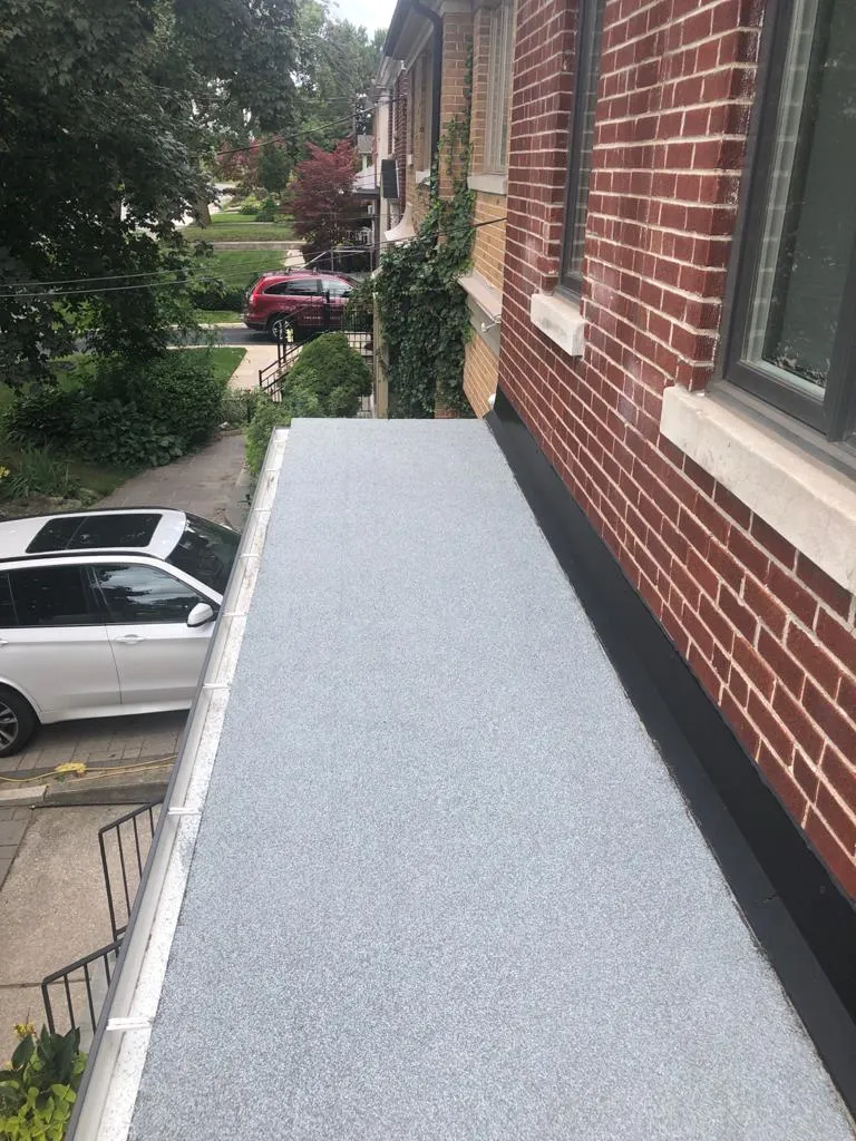 Cold-ply flat roof membrane with ceramic granule surfacing in Toronto, view 17