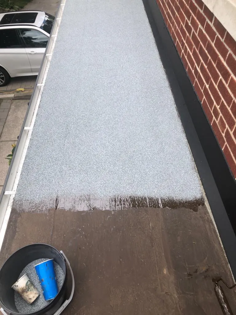 Cold-ply flat roof membrane with ceramic granule surfacing in Toronto, view 18
