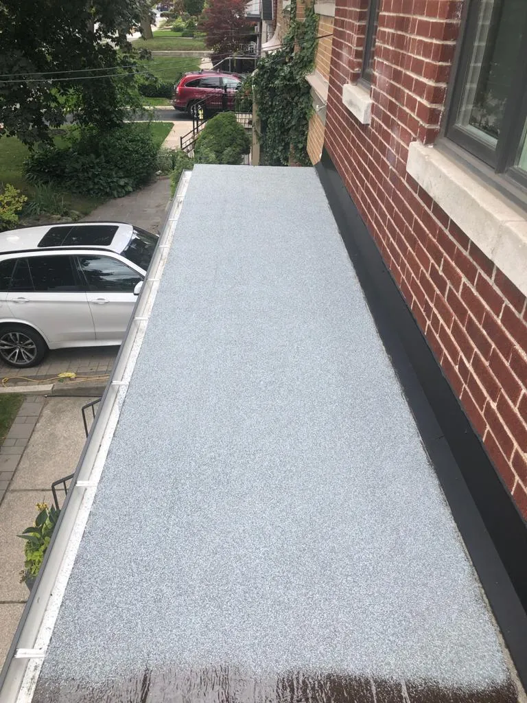 Cold-ply flat roof membrane with ceramic granule surfacing in Toronto, view 19