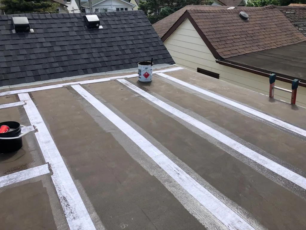 Cold-ply flat roof membrane with ceramic granule surfacing in Toronto, view 23
