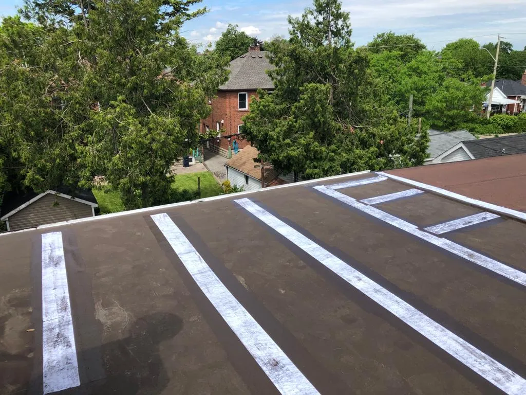 Cold-ply flat roof membrane with ceramic granule surfacing in Toronto, view 24
