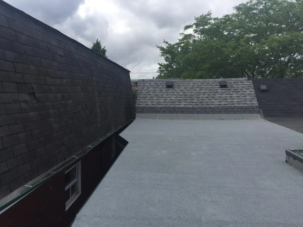 Cold-ply flat roof membrane with ceramic granule surfacing in Toronto, view 35