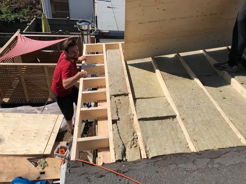 Attic space removal and rebuild above a Toronto flat roof, view 10