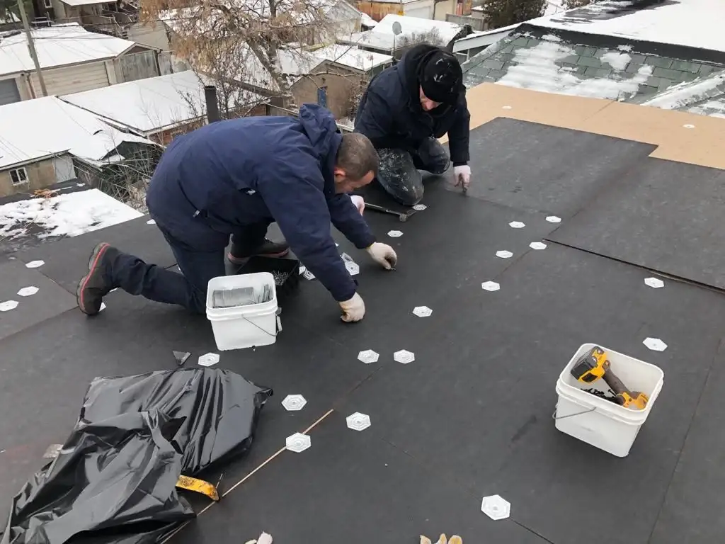 Attic space removal and rebuild above a Toronto flat roof, view 12