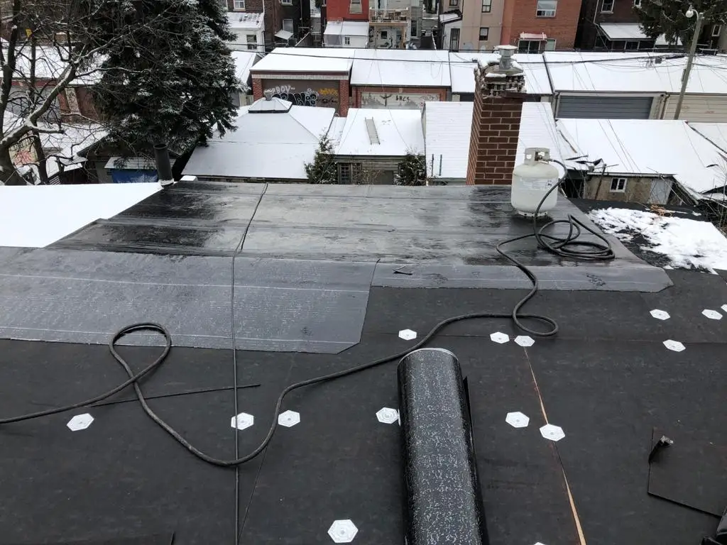 Attic space removal and rebuild above a Toronto flat roof, view 13