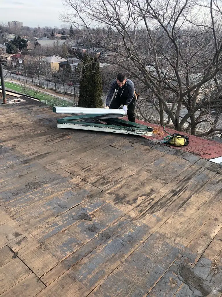Attic space removal and rebuild above a Toronto flat roof, view 15