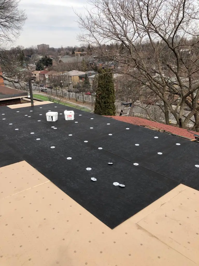 Attic space removal and rebuild above a Toronto flat roof, view 20
