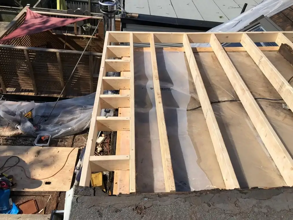 Attic space removal and rebuild above a Toronto flat roof, view 5