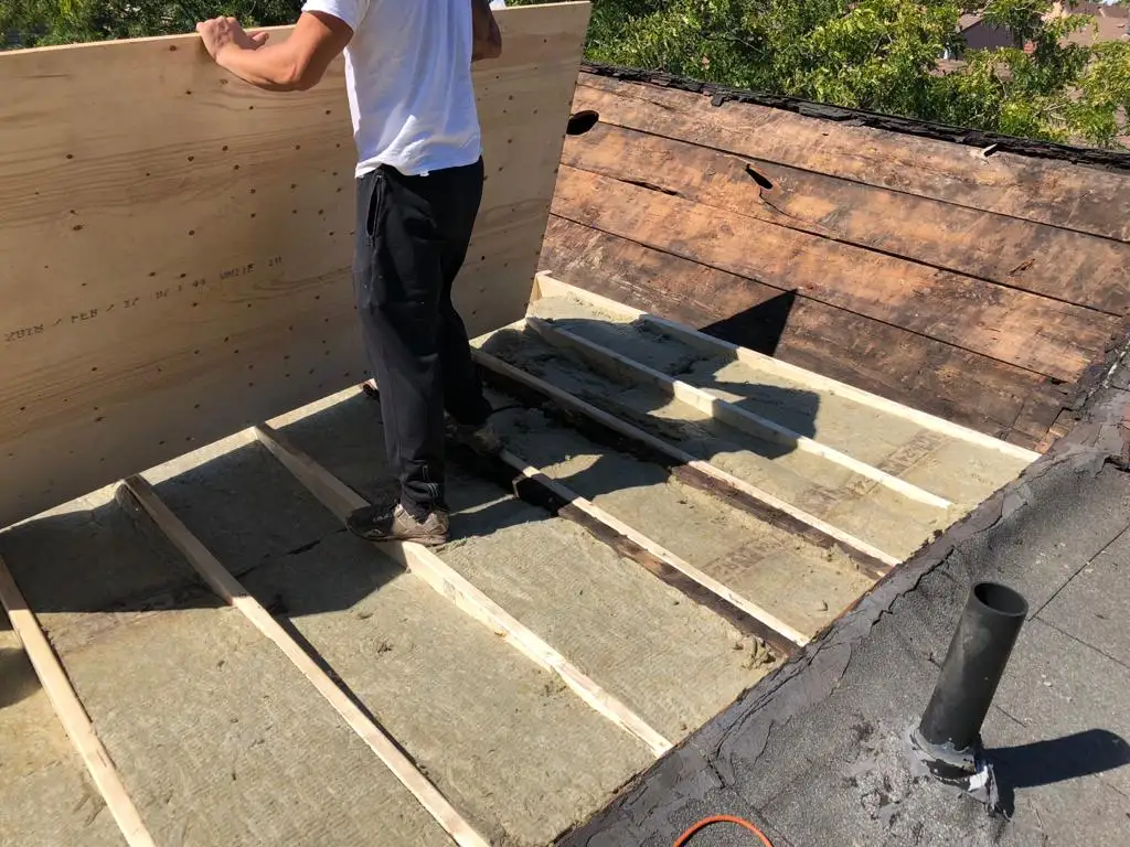 Attic space removal and rebuild above a Toronto flat roof, view 8