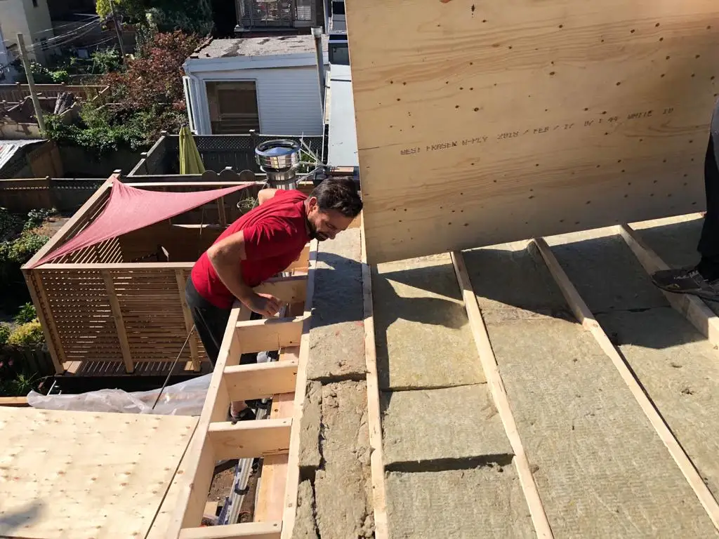 Attic space removal and rebuild above a Toronto flat roof, view 9