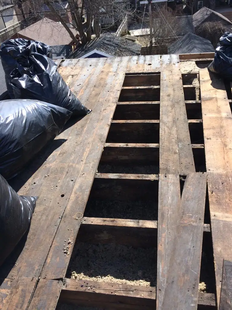 Parapet wall repair and reflashing on a Toronto flat roof, view 11