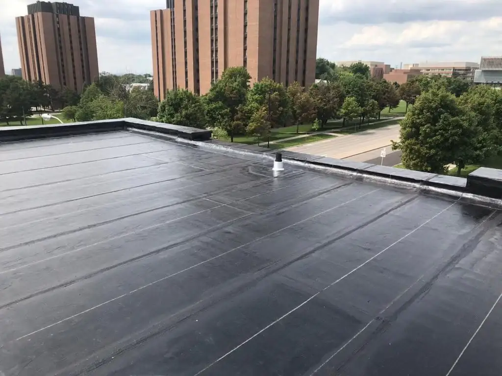 Parapet wall repair and reflashing on a Toronto flat roof, view 4