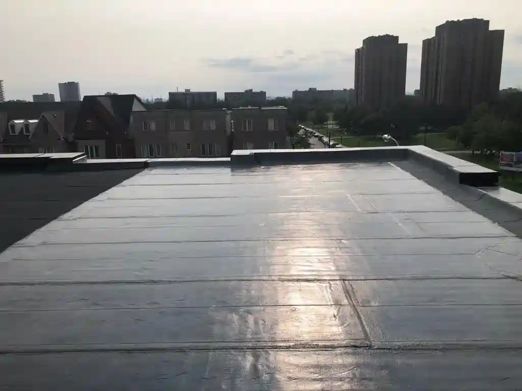 Parapet wall repair and reflashing on a Toronto flat roof, view 5