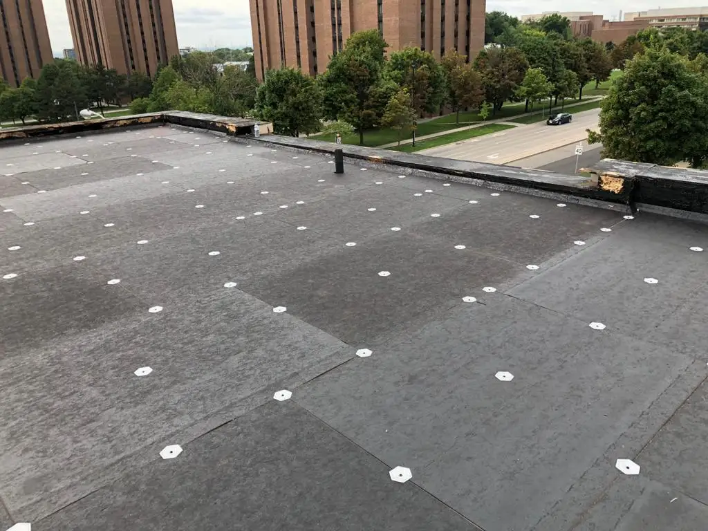Parapet wall repair and reflashing on a Toronto flat roof, view 6