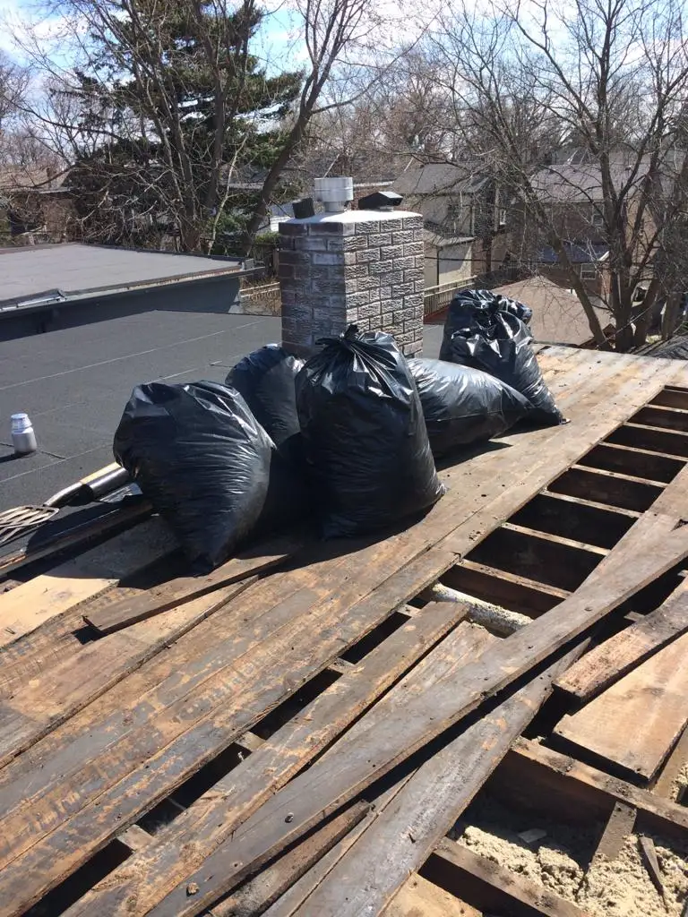 Parapet wall repair and reflashing on a Toronto flat roof, view 7
