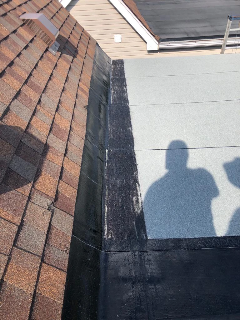 Flat Roofs Toronto roofing crew working on a flat roof, view 6