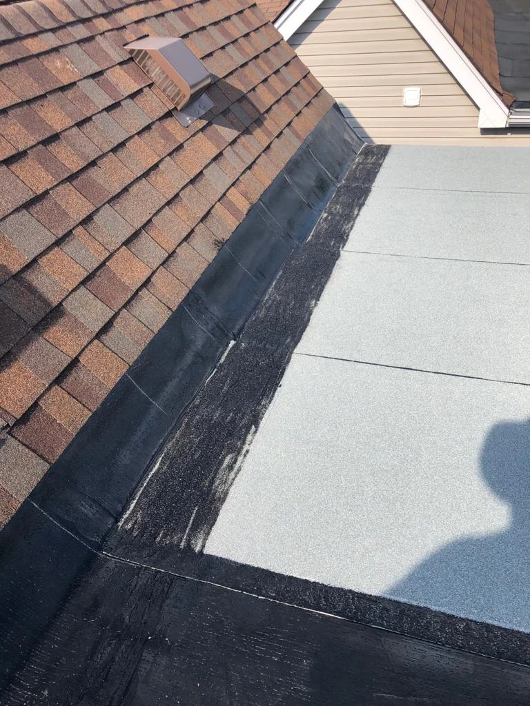 Flat Roofs Toronto roofing crew working on a flat roof, view 7