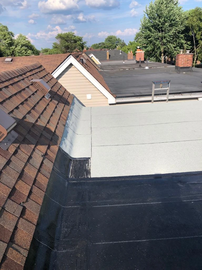 Flat Roofs Toronto roofing crew working on a flat roof, view 8
