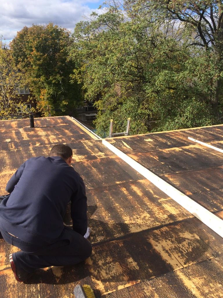 Flat Roofs Toronto roofing crew working on a flat roof, view 9