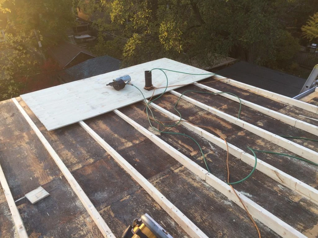 Flat Roofs Toronto roofing crew working on a flat roof, view 16
