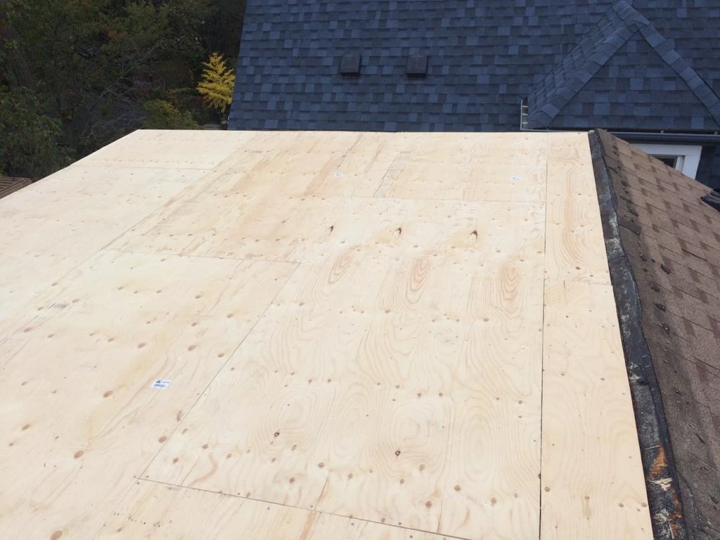 Flat Roofs Toronto roofing crew working on a flat roof, view 18