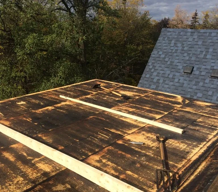 Flat Roof Warranty Guide: What TPO, EPDM and Modified Bitumen Manufacturers Actually Cover