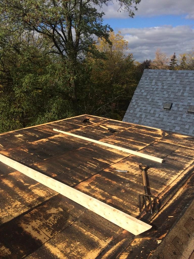 Flat Roofs Toronto roofing crew working on a flat roof, view 14