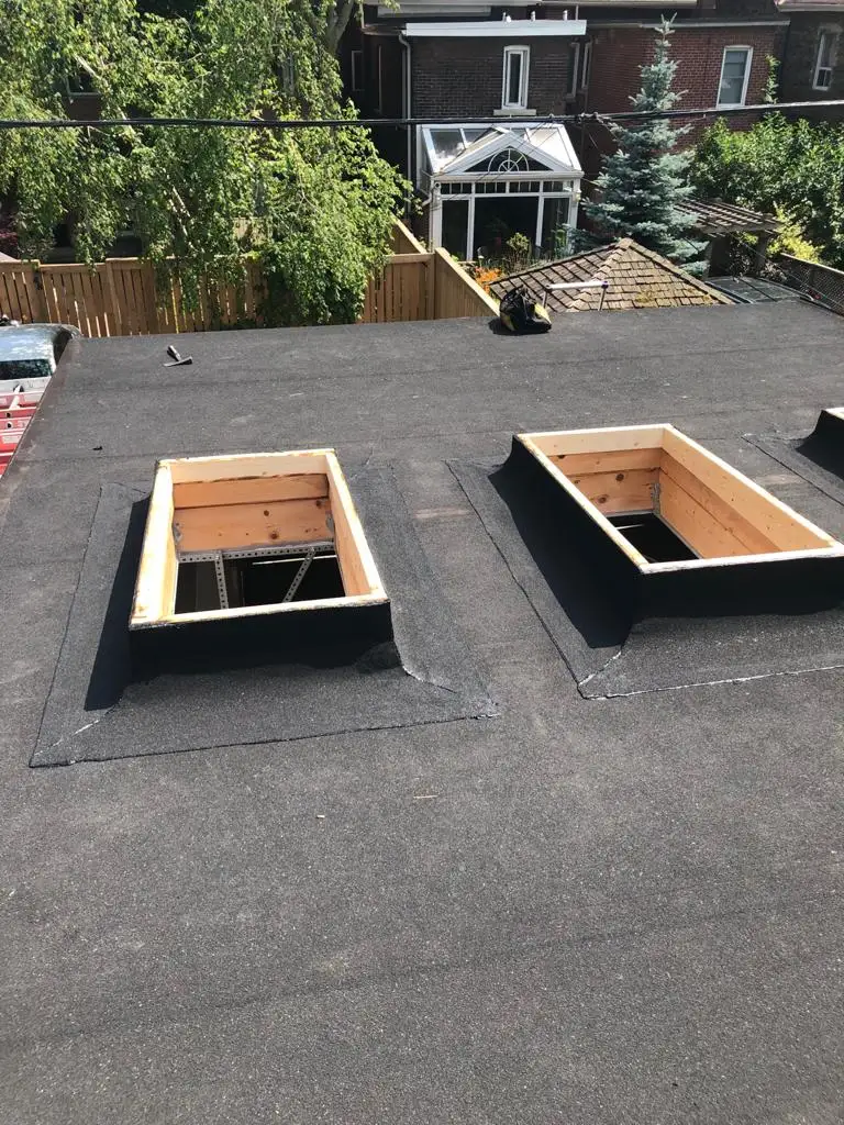Skylight curb and flashing on a Toronto flat roof, view 11