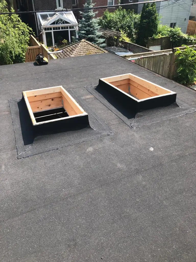 Skylight curb and flashing on a Toronto flat roof, view 12