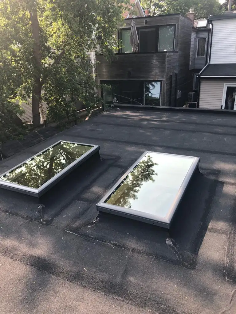 Skylight curb and flashing on a Toronto flat roof, view 13