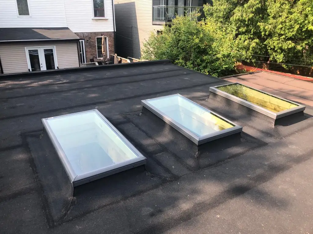 Skylight curb and flashing on a Toronto flat roof, view 15