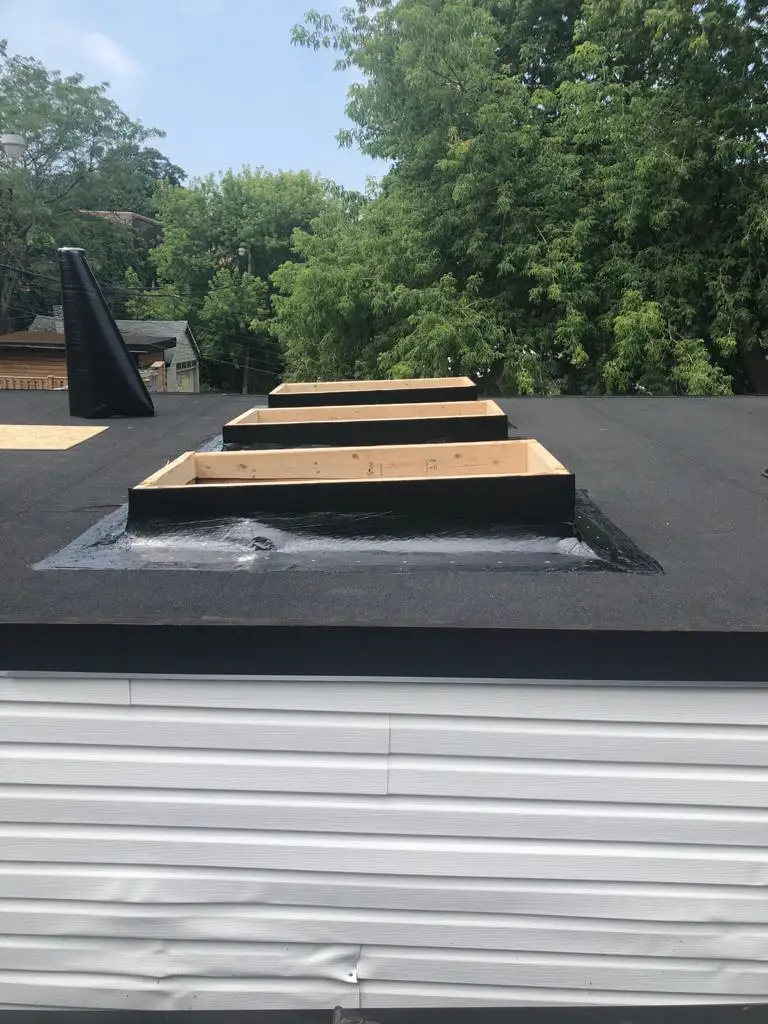 Skylight curb and flashing on a Toronto flat roof, view 2