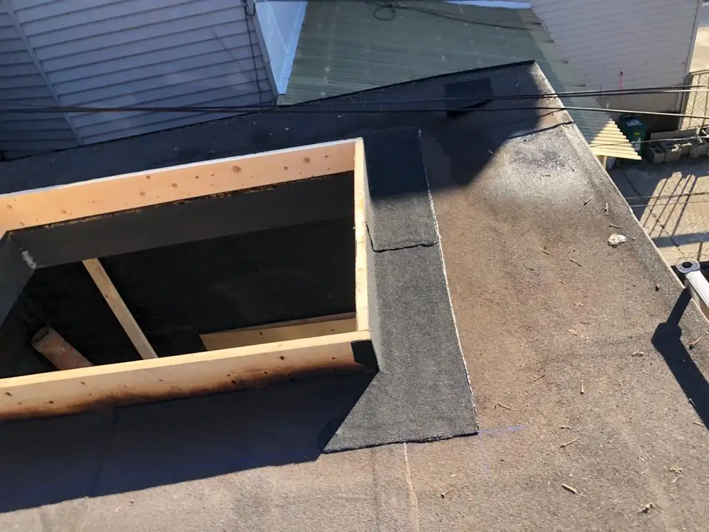 Skylight curb and flashing on a Toronto flat roof, view 20