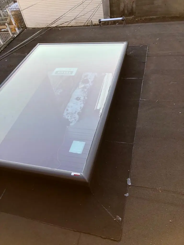 Skylight curb and flashing on a Toronto flat roof, view 22