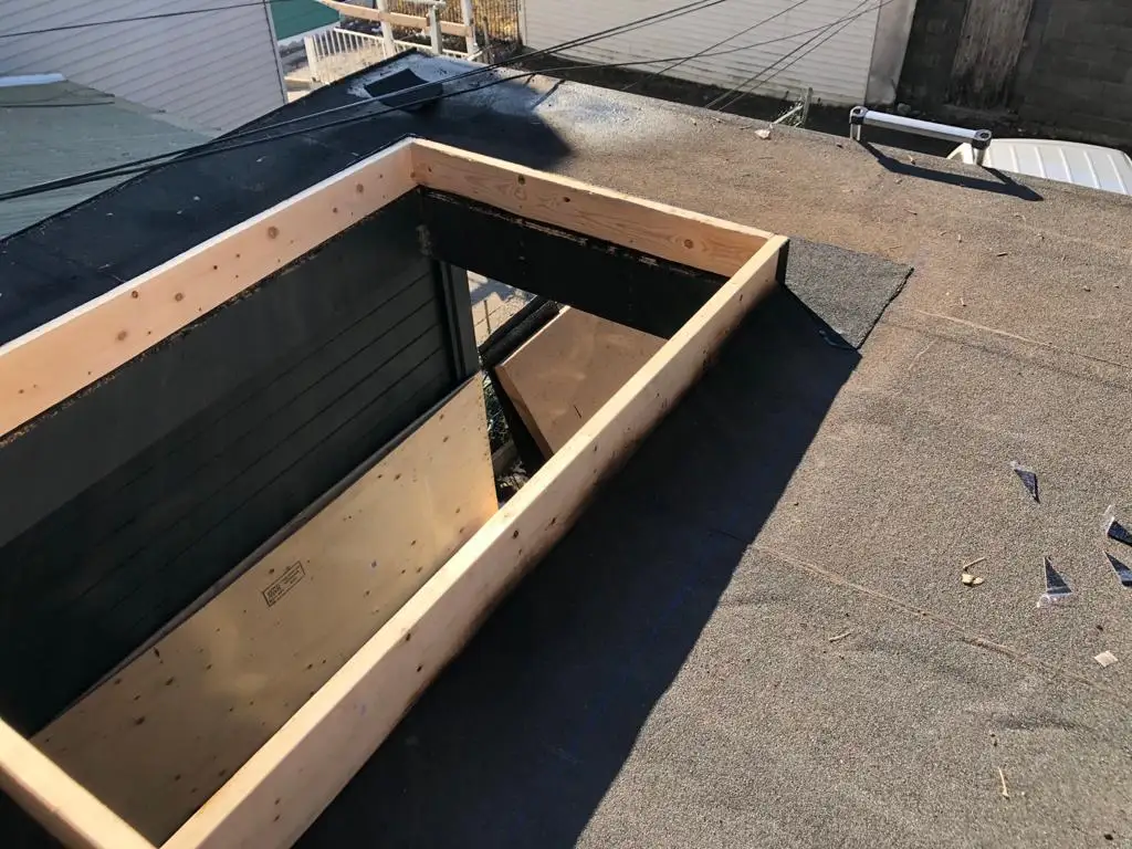 Skylight curb and flashing on a Toronto flat roof, view 26