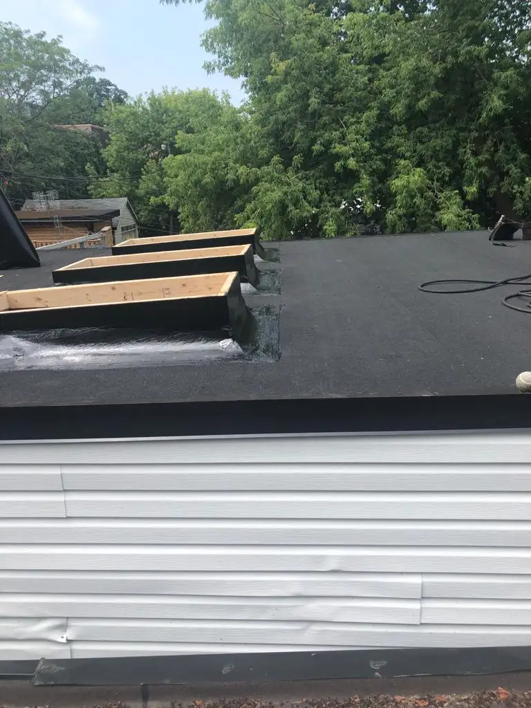 Skylight curb and flashing on a Toronto flat roof, view 3
