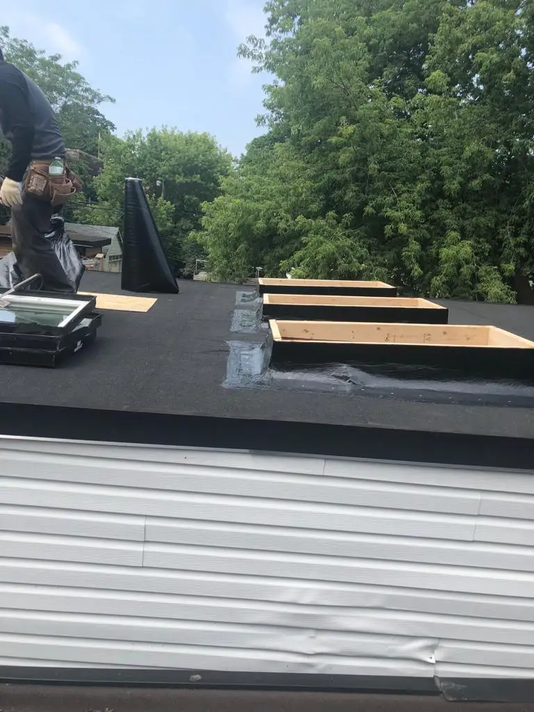 Skylight curb and flashing on a Toronto flat roof, view 4