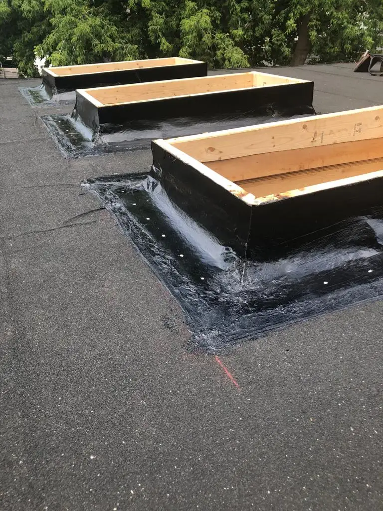 Skylight curb and flashing on a Toronto flat roof, view 5