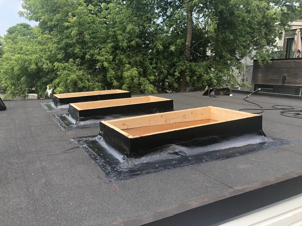 Skylight curb and flashing on a Toronto flat roof, view 6