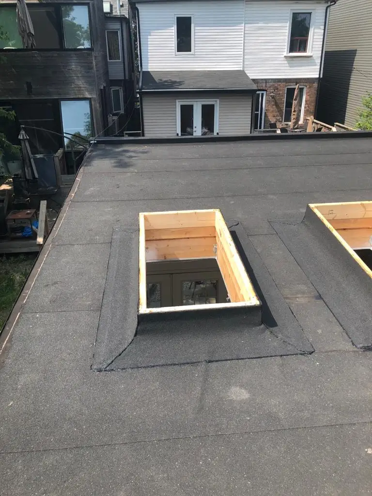 Skylight curb and flashing on a Toronto flat roof, view 7
