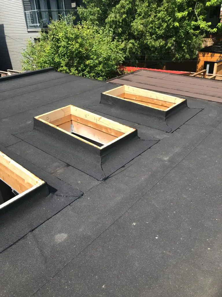 Skylight curb and flashing on a Toronto flat roof, view 8